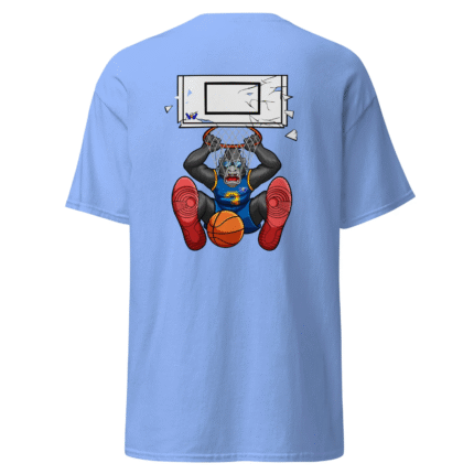 Image of a Carolina blue T-shirt with the print of Goalrilla mascot slamming the basketball through the basketball goal and shattering the glass of the backboard.
